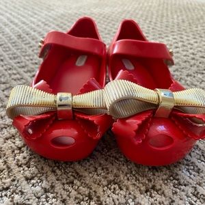 Mini Melissa red with gold bows